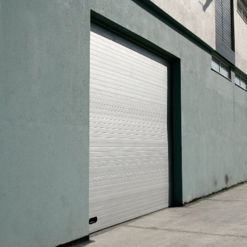 Porte de garage Fontaine 38600